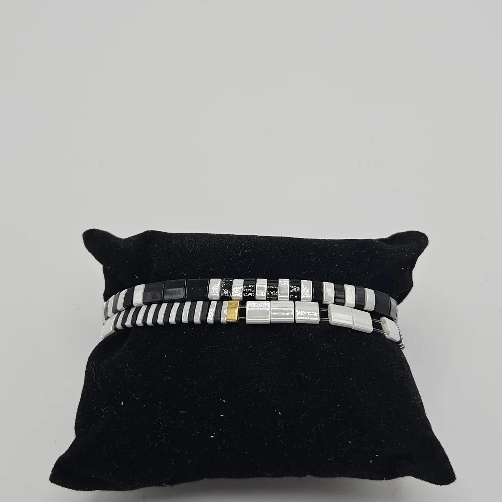 BPD pair of Pixie stretch bracelets black white gold